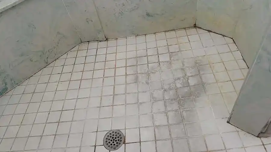 Shower floor detail before cleaning